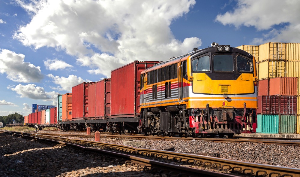 Freight train with shipping containers